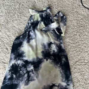 Never worn, tie neck sleeveless shirt